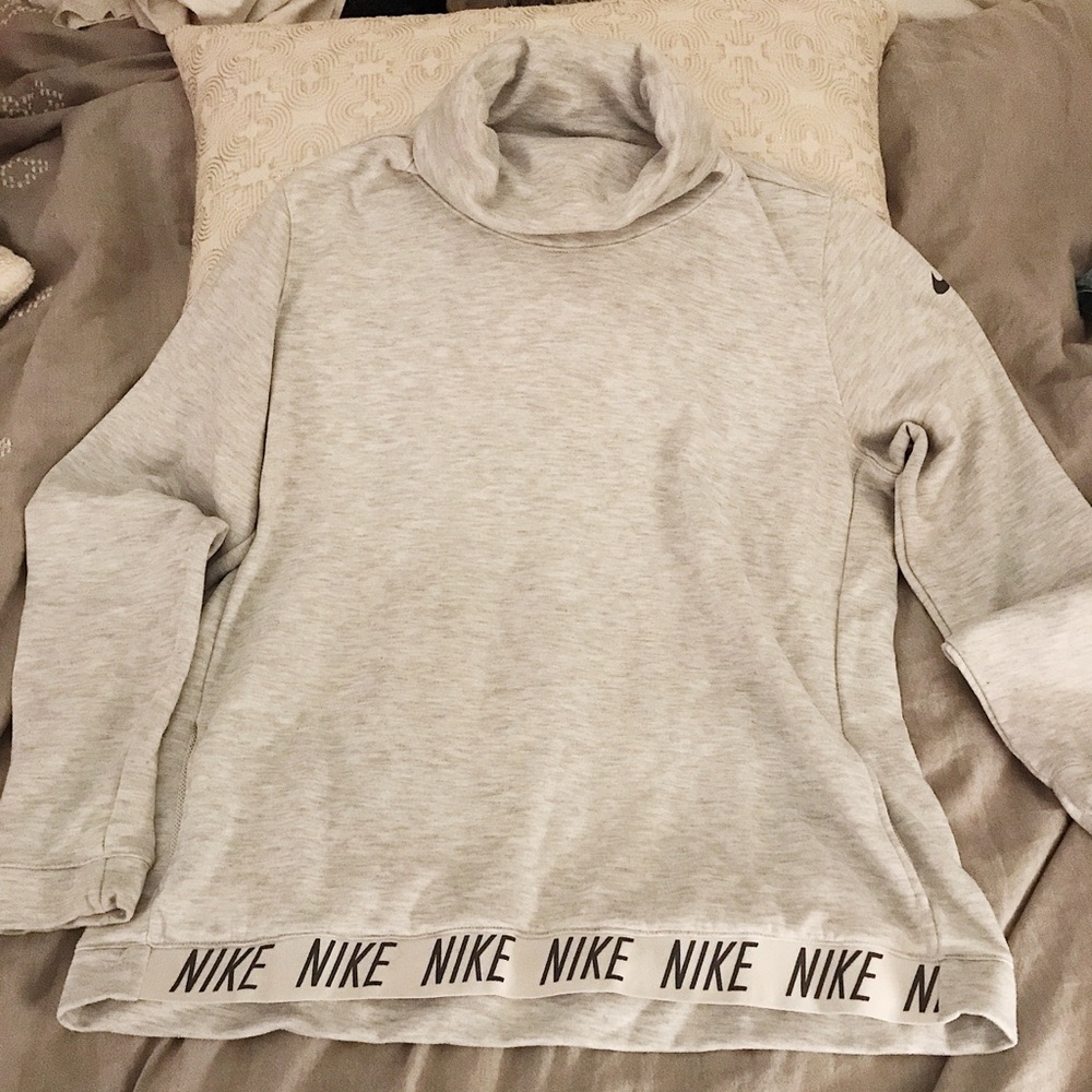 Nike pull over size XL fits like a large!